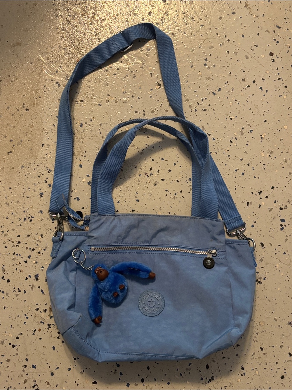 Kipling Light Blue Crossbody Bag with Charm